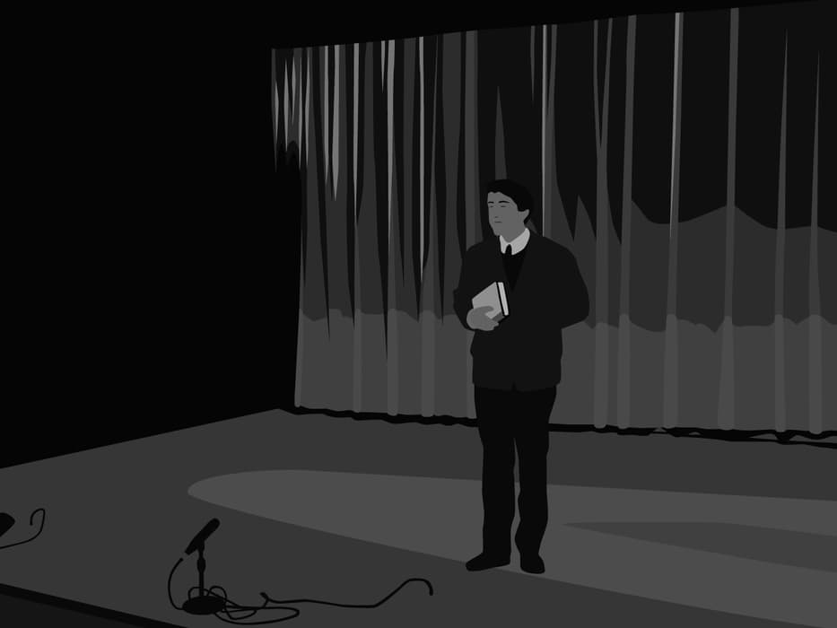Stylized grayscale illustration of a man in a suit holding a book, standing on stage in front of closed curtains with a microphone lying on the floor.