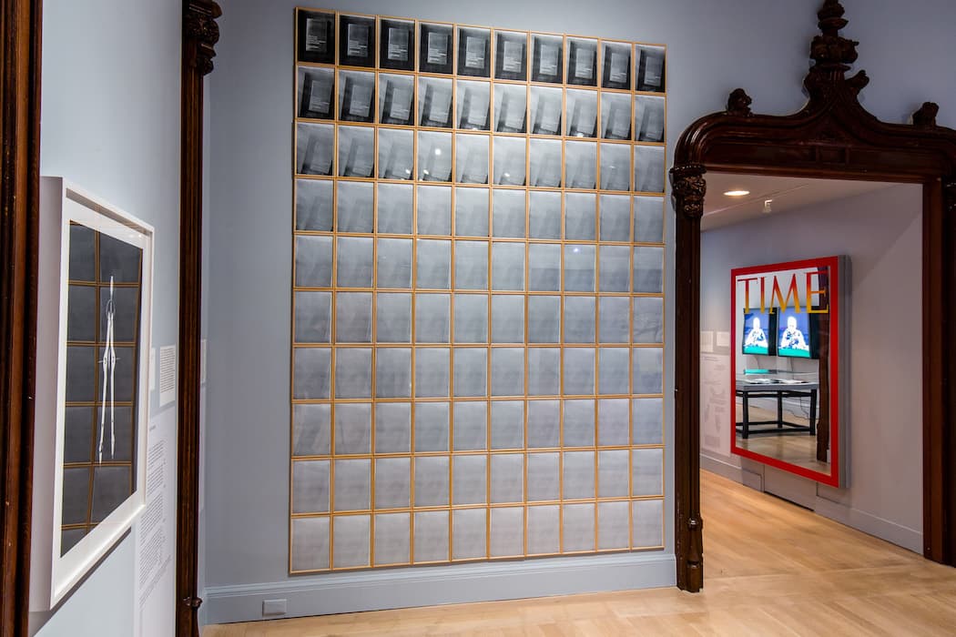 i REPRODUCTION TECHNOLOGY, LITHOGRAPHY 

Timm Ulrichs, Walter Benjamin: “The Work of Art in the Age of Mechanical Reproduction”—Interpretation: Timm Ulrichs, The Photocopy of the Photocopy of the Photocopy of the Photocopy,” 1967
Sequence of 100 black-and-white photocopies, wooden frames
Courtesy of the artist and Wentrup, Berlin

Though The Arcades Project was his magnum opus, Walter Benjamin is best known for his 1936 essay “The Work of Art in the Age of Mechanical Reproduction.” Photography and film, he argued, have profoundly altered the ways in which we experience art; by allowing the dissemination of infinite copies of an image, they have divested the original of its almost magical status.

Among the technologies of photomechanical reproduction, photocopy machines, in particular, prioritize efficiency over beauty, reducing clarity and detail to create serviceable replicas. Yet photocopying is an act of transformation. To create this work, Timm Ulrichs made one thousand copies of the cover of Benjamin’s essay; each successive copy was made from the one before. This display shows every tenth copy, revealing the visual noise that invades the image as the photocopy machine loses information from the original and introduces incidental details of its own, from dust on the glass to smeared ink. Thus, a purely pragmatic object is imbued with the mysterious markings of time and process that give a work of art its singular power.