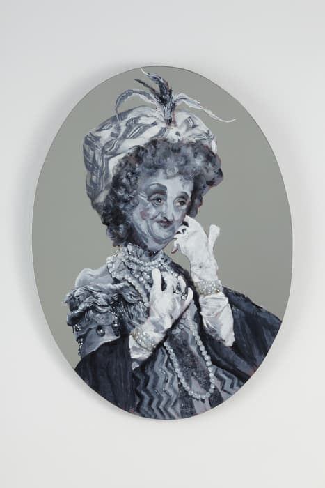 Oval-shaped painting by Rachel Feinstein depicting a woman in elaborate 18th-century-style costume with curly hair, a large feathered hat, pearl necklaces, and gloves, rendered in shades of gray against a neutral background.