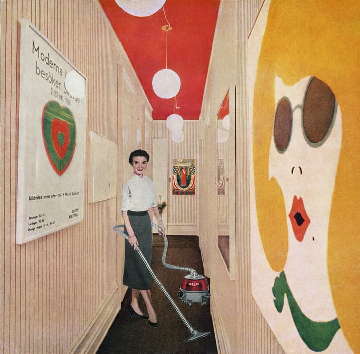 A vintage-style collage of a smiling woman vacuuming a hallway decorated with bold modern art posters, striped wallpaper, and a vivid red ceiling with round hanging lights.