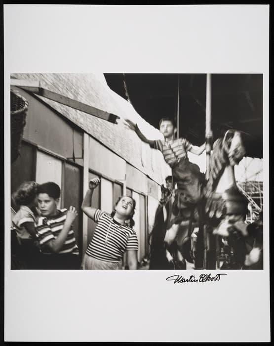 Martin Elkort. Grabbing the Brass Ring, Coney Island, c. 1951, printed later. Gelatin silver print. Gift of the Estate of Martin Elkort, 2020-16.
